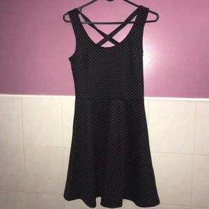 Black skater dress with white polka dots